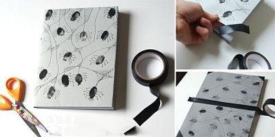 Trang tr&#237; sổ tay th&#224;nh h&#236;nh con nhện cực độc từ v&#226;n tay